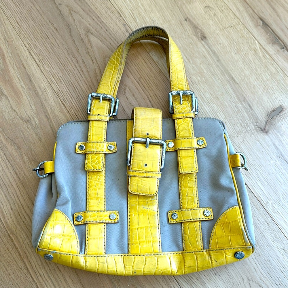 Yellow and canvas Michael Kors doctor bag with silver hardware.